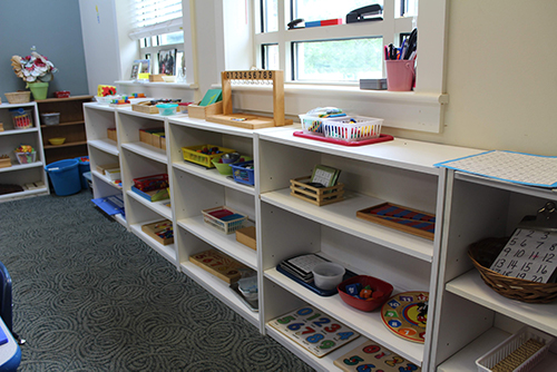Shelves of activities for preschool children.