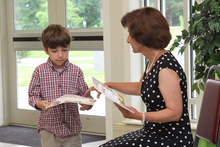 Ms. Ruhi with a student at the Graduation Ceremony.