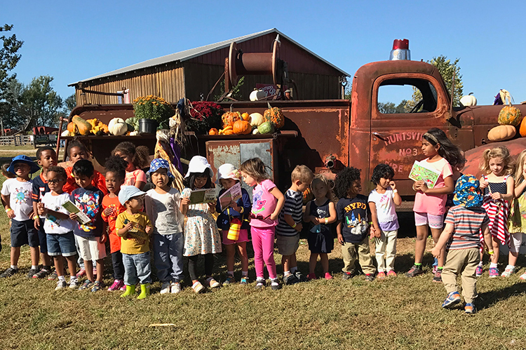 Children enjoying a field trip to Lyon Family Farms.